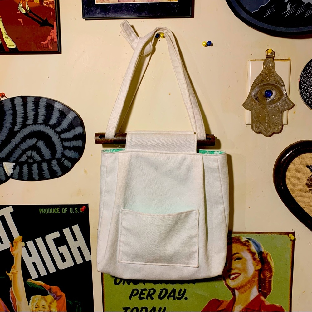 Cute mini tote bag with cute closure detailing
